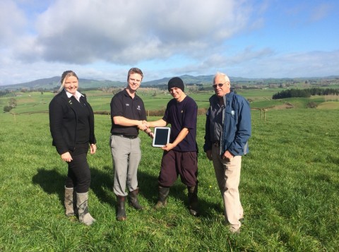 Young Farmers Casey Huffstutler, St John BDM Andrew James and Waikato Federated Farmers Chair Lloyd Downing, present course attendee and prize winner Stephen Needham (from Walton rural Waikato) with the Panasonic Toughpad.